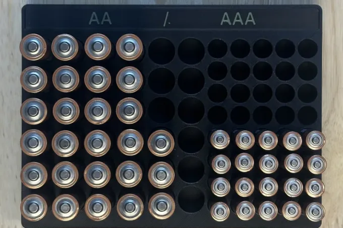 A tray of AA and AAA batteries